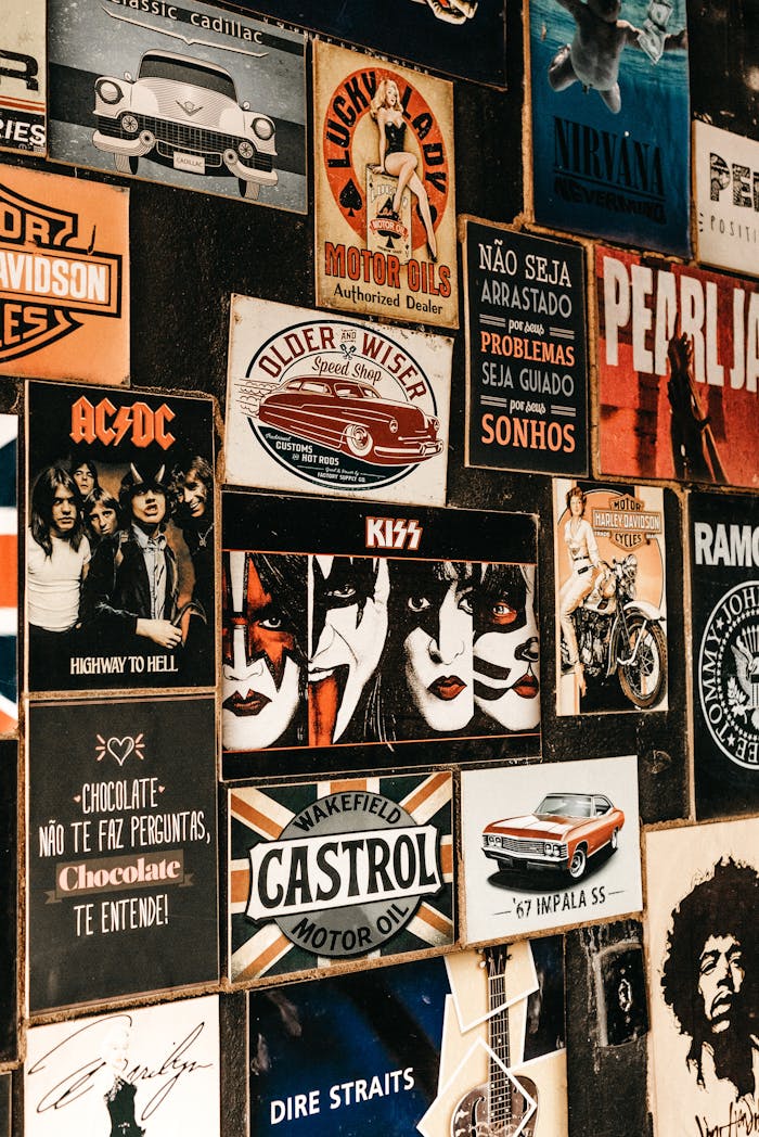 our-services-2 A collage of iconic rock band posters and vintage advertisements on a textured wall.
